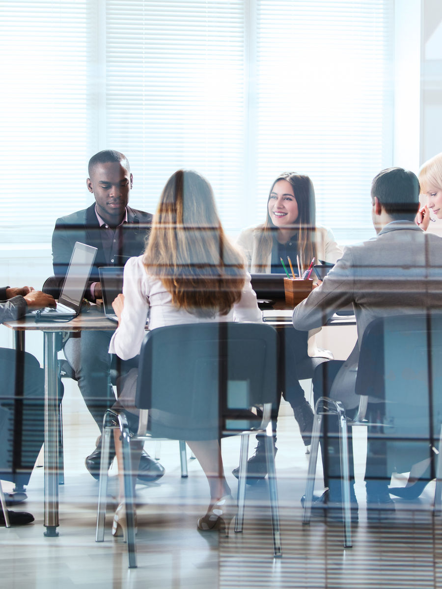 Laboratory consultants reviewing a plan together